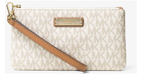 michael kors jet set logo wristlet|Michael Kors wristlets.